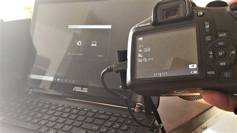 How do I install a camera on my laptop?