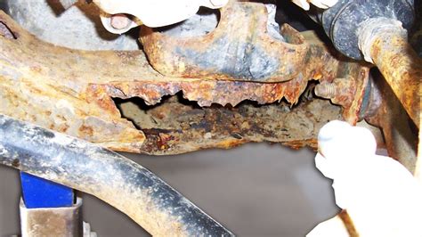 How do I know if my car frame is rotted?