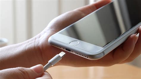 How do I know if my iPhone charging port is damaged?