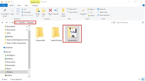 How do I make all my Screenshots go to a folder in Windows?