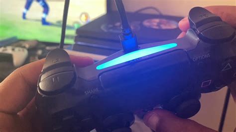 How do I manually connect my PS4 controller to my PS4?
