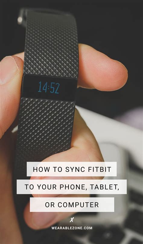 How do I manually sync my Fitbit?