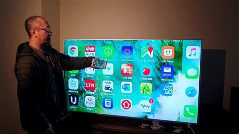 How do I project my phone screen to my TV?