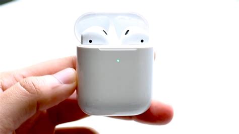 How do I put my AirPods in pairing mode?