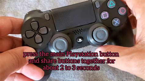 How do I put my PS4 controller in pair mode?