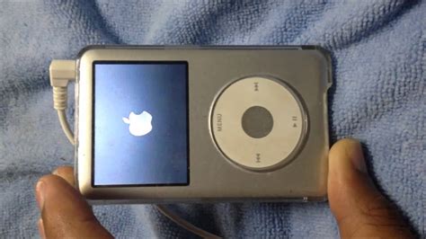 How do I restore my iPod classic 160gb to factory settings?