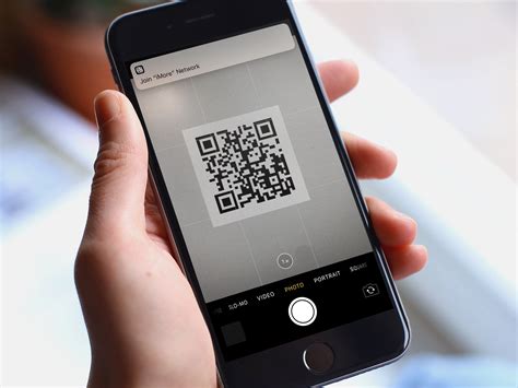 How do I scan a QR code on my iPhone or iPad?