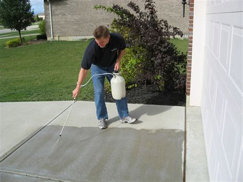 How do I seal my concrete driveway?