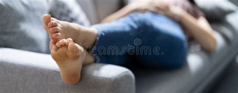 How do I stop my boyfriends feet from smelling?
