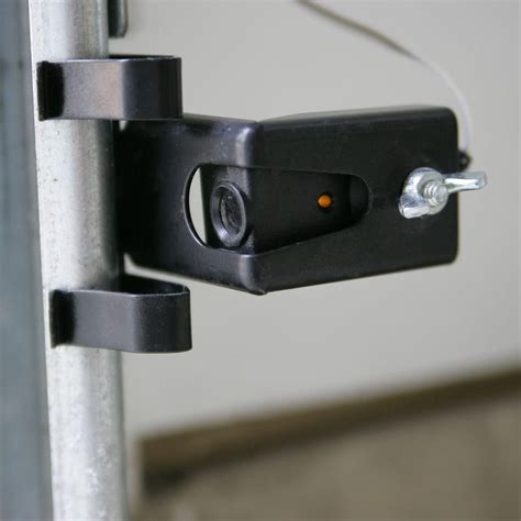 How do I stop my garage door sensor from being affected by the sun?