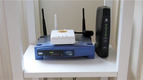 How do I turn my old router into a WiFi extender?