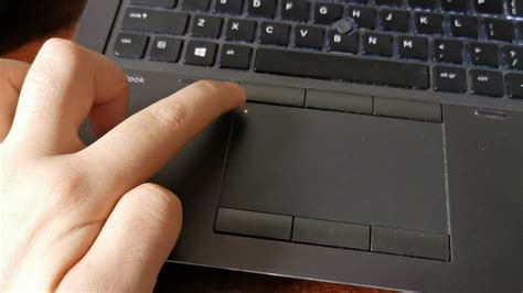 How do I unlock my laptop touchpad?