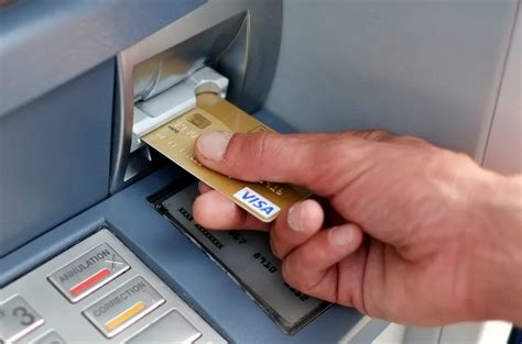 How do I use my ATM card for the first time?