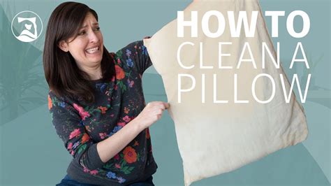 How do I wash a pillow by hand?