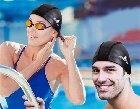How do professional swimmers protect their hair?