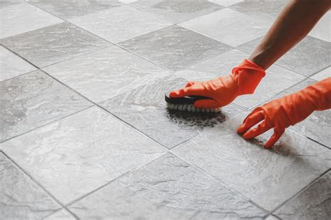 How do professionals clean tile floors?