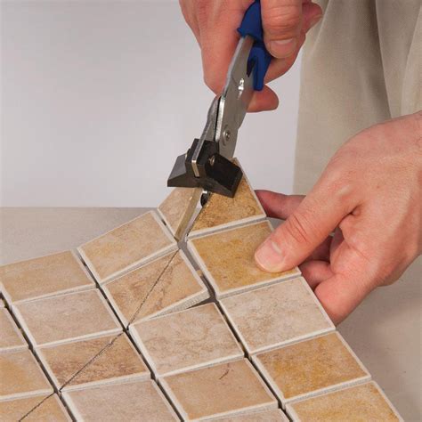 How do professionals cut tiles?