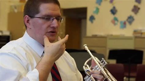 How do trumpet players puff their cheeks?