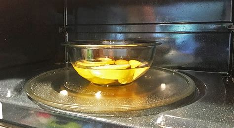 How do you boil lemons to get rid of burnt smell?