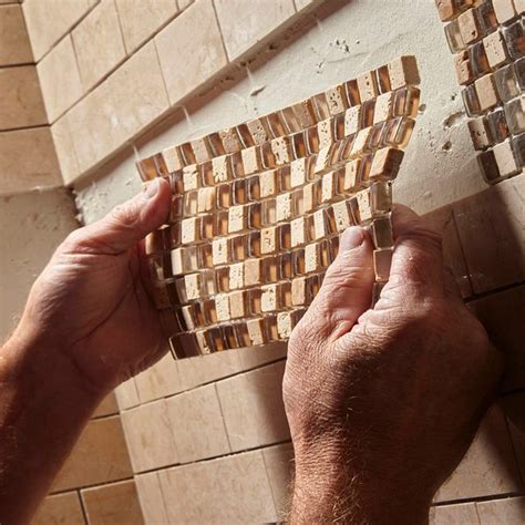 How do you break small mosaic tiles?