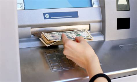 How do you cash money into an ATM?