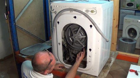How do you change a belt on a front load washer?