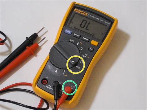 How do you check continuity with a digital multimeter?