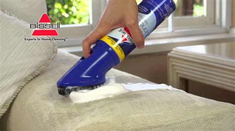 How do you clean BISSELL upholstery?