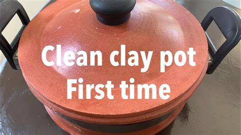 How do you clean a burnt claypot?