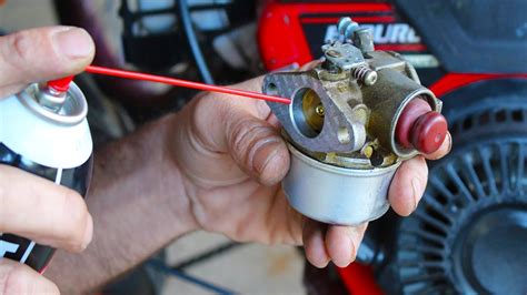 How do you clean a small gas engine carburetor?