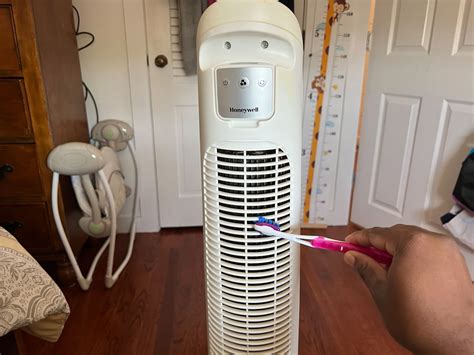 How do you clean a tower fan that doesn't open?