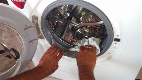 How do you clean a washing machine belt?