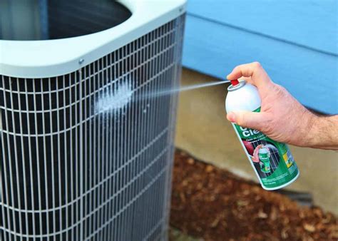 How do you clean an outside AC unit with water hose and water?