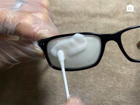 How do you clean anti reflective coating lenses?