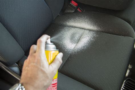 How do you clean car interior fabric?