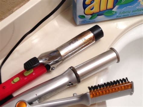 How do you clean hot curlers?