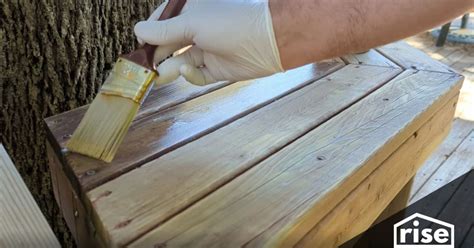 How do you clean raw wood before sealing?