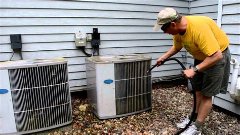How do you clean the coils on your air conditioner?
