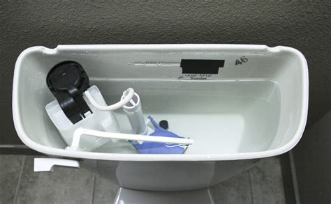 How do you clean the inside of a toilet tank?