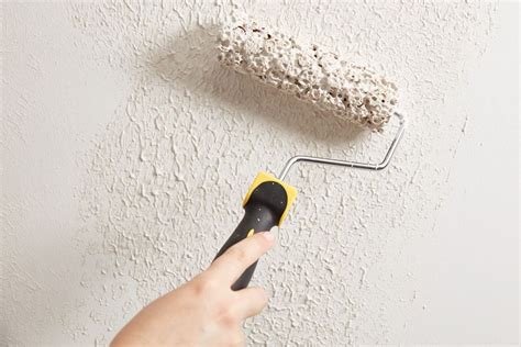 How do you cover textured walls without plastering?