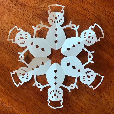 How do you cut a snowflake snowman?