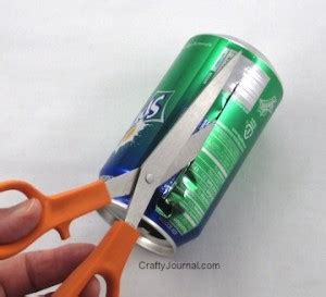 How do you cut a soda can with scissors?