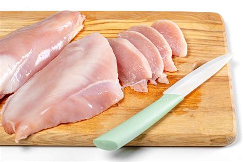 How do you cut chicken breast into thin pieces?