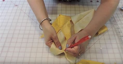 How do you cut fabric to make a corner?