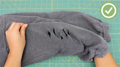 How do you cut the hem of a sweatshirt?