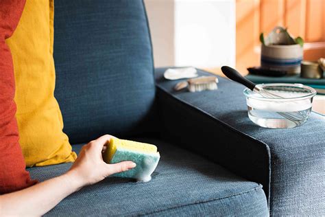 How do you deep clean a fabric couch?