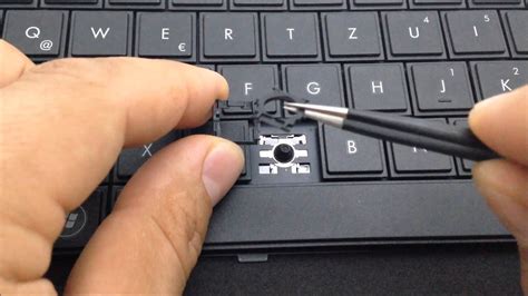 How do you eject a keyboard key?