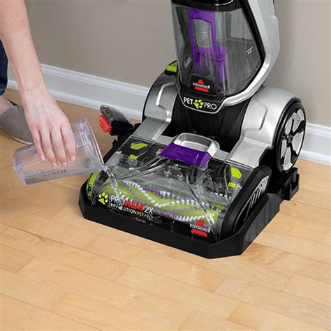 How do you fill a Bissell Proheat 2x carpet cleaner?