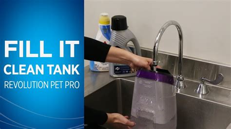 How do you fill a Bissell Proheat water tank?