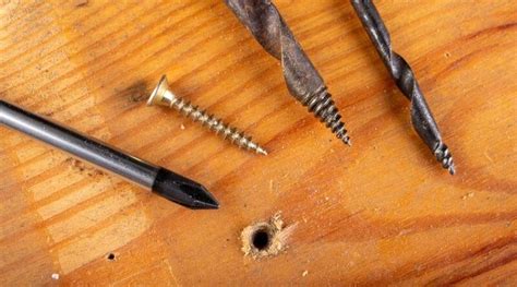 How do you fix a screw hole that is too big in wood?